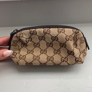 Small authentic Gucci cosmetic bag.